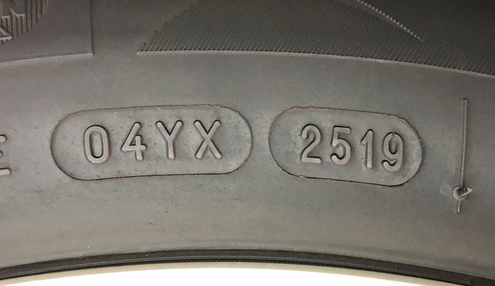 Tire sidewall with manufacturing date